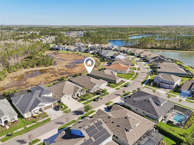 aerial view with a water view and a residential view