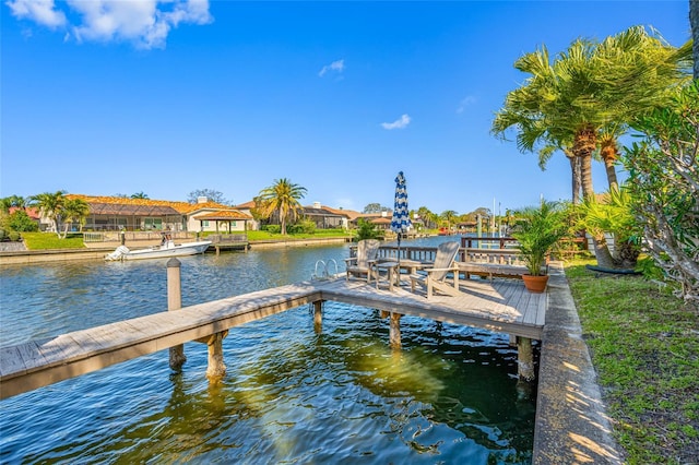 dock area featuring a water view