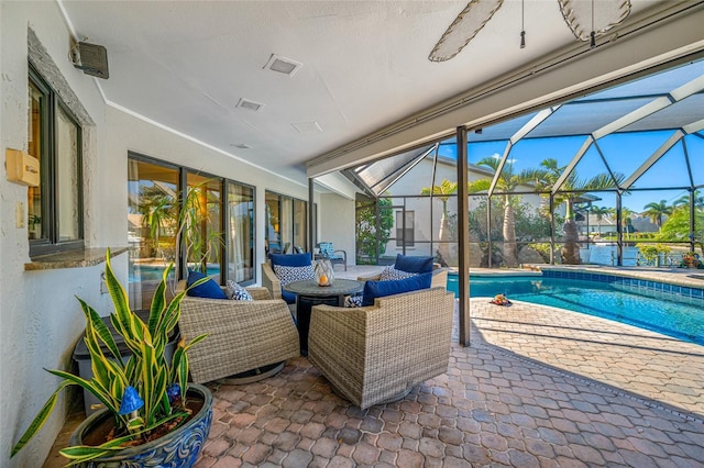 exterior space with a patio area, a lanai, and outdoor lounge area