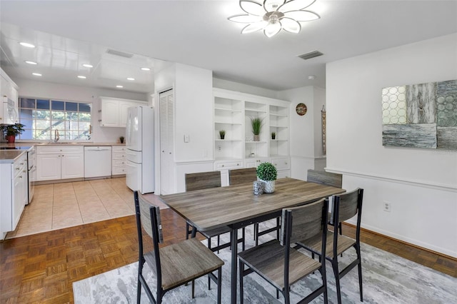 dining area with recessed lighting and visible vents