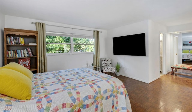 bedroom featuring baseboards