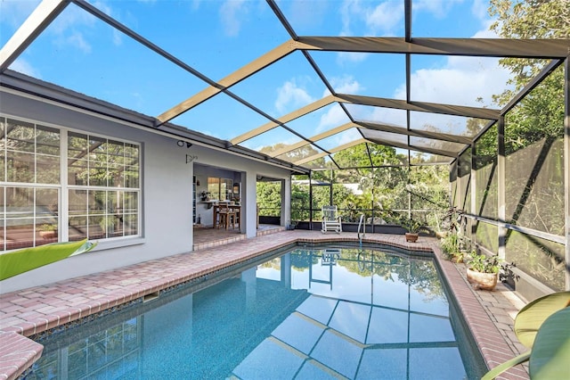 pool featuring a patio and a lanai