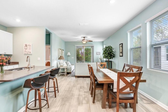 dining space with recessed lighting, baseboards, light wood-type flooring, and ceiling fan