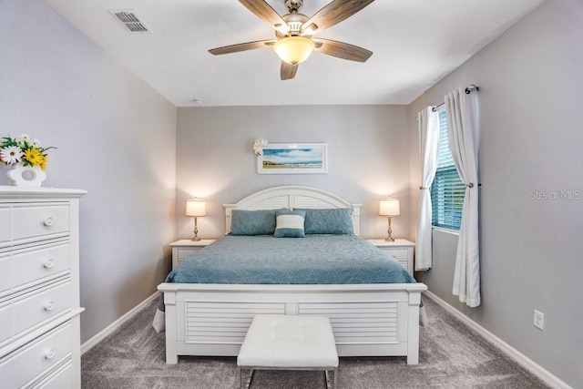 bedroom featuring visible vents, baseboards, and carpet floors