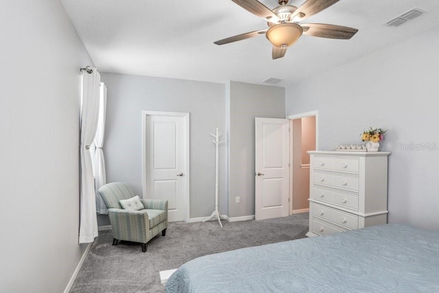 bedroom with baseboards, visible vents, carpet floors, and ceiling fan