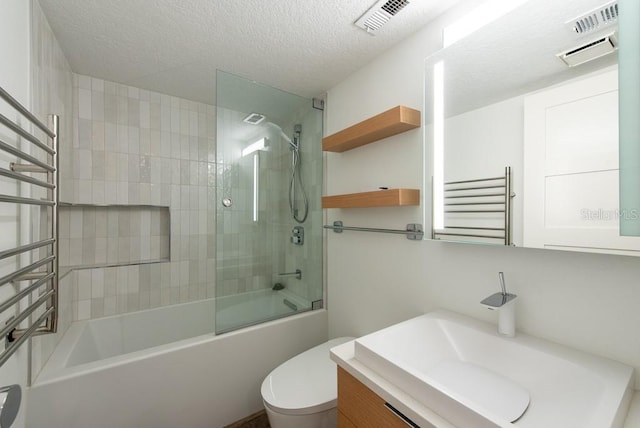 full bathroom featuring visible vents, toilet, a textured ceiling, radiator heating unit, and bathtub / shower combination