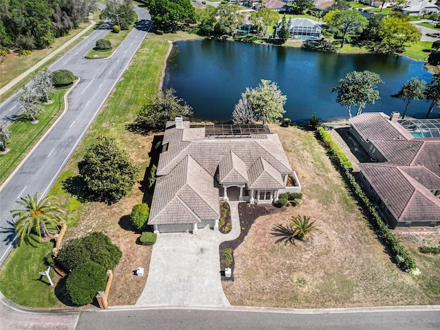 drone / aerial view with a water view