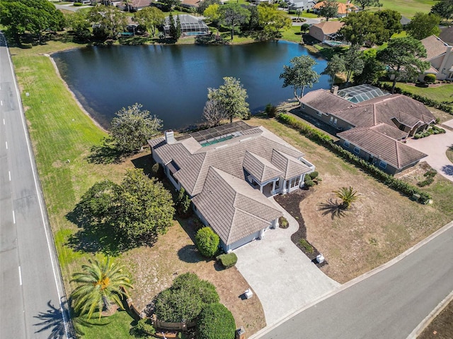 aerial view featuring a water view and a residential view