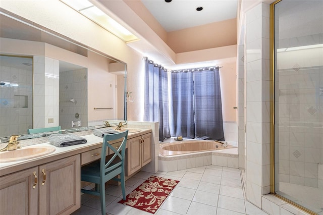 full bathroom featuring tile patterned floors, a tile shower, vanity, and a garden tub