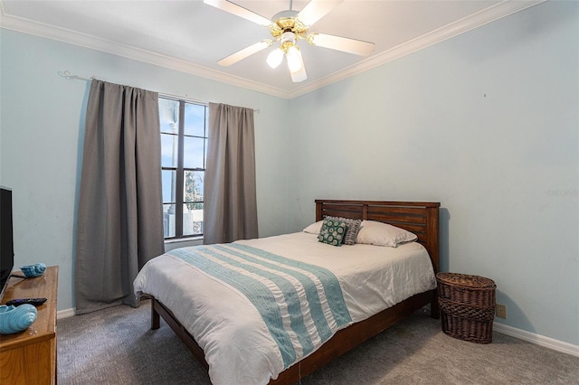 carpeted bedroom featuring ceiling fan, baseboards, and ornamental molding