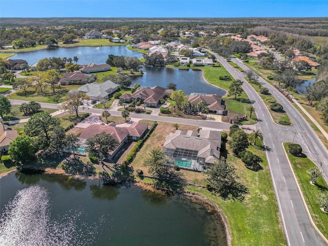 aerial view featuring a residential view and a water view