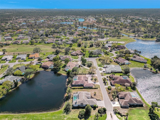 aerial view featuring a residential view and a water view