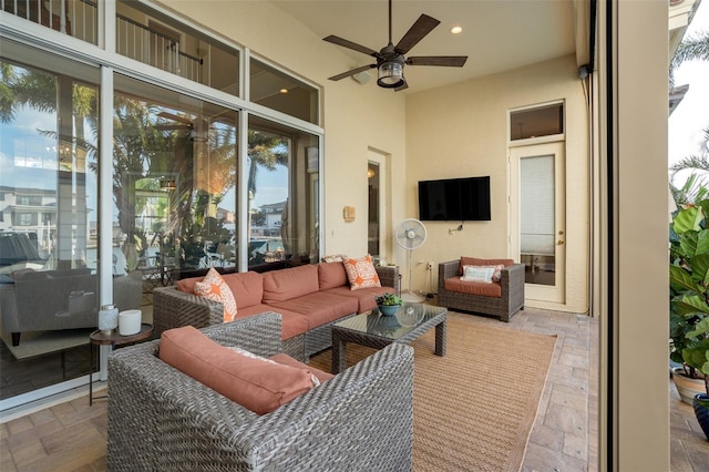 view of patio featuring outdoor lounge area and a ceiling fan