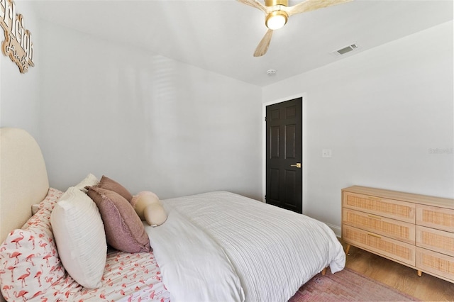 15703 Jericho Dr, Odessa, FL 33556 - bedroom with wood finished floors and ceiling fan