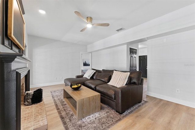 15703 Jericho Dr, Odessa, FL 33556 - living room with light wood-style floors, a ceiling fan, baseboards, vaulted ceiling, and recessed lighting