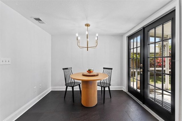 15703 Jericho Dr, Odessa, FL 33556 - dining room featuring a chandelier, baseboards, and dark tile patterned floors