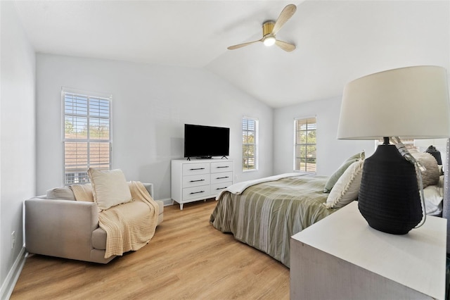 15703 Jericho Dr, Odessa, FL 33556 - bedroom with light wood-style flooring, vaulted ceiling, baseboards, and ceiling fan