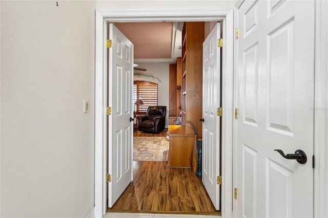 hallway featuring wood finished floors