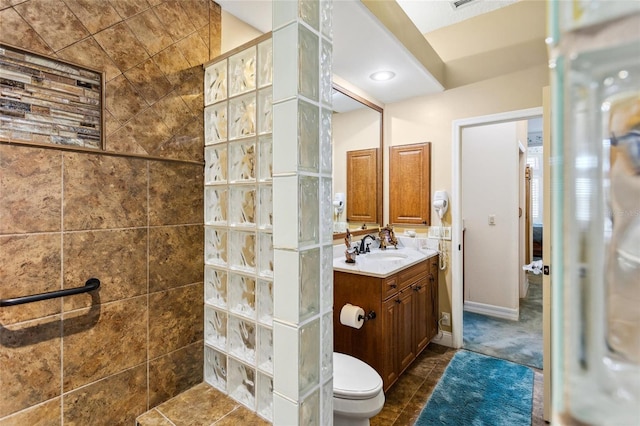 full bath featuring a walk in shower, toilet, recessed lighting, tile patterned floors, and vanity