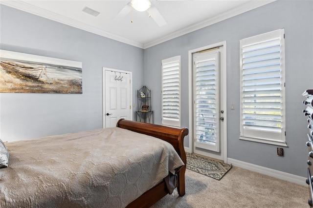 bedroom with visible vents, ceiling fan, baseboards, carpet, and ornamental molding