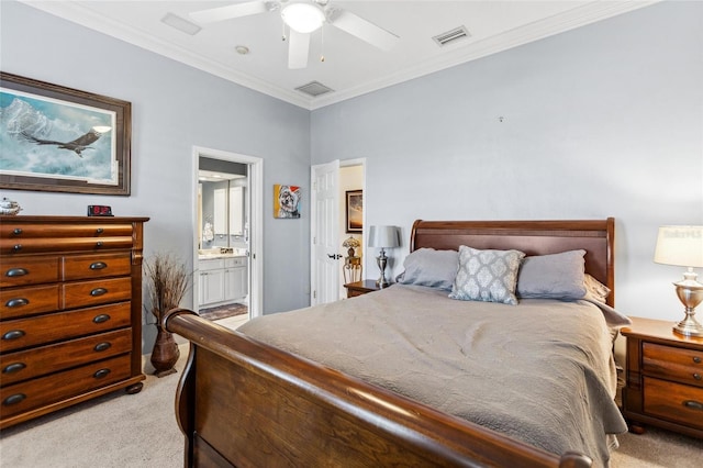 bedroom featuring visible vents, ensuite bath, ceiling fan, light carpet, and crown molding