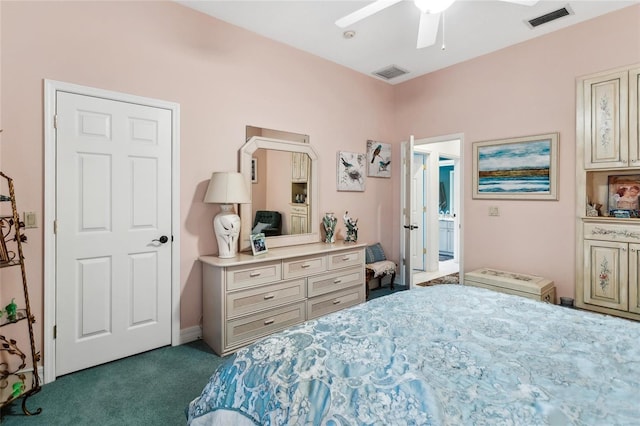 carpeted bedroom featuring visible vents and a ceiling fan