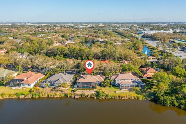 birds eye view of property featuring a residential view and a water view