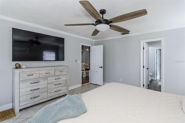 bedroom with light tile patterned floors, baseboards, visible vents, ceiling fan, and crown molding