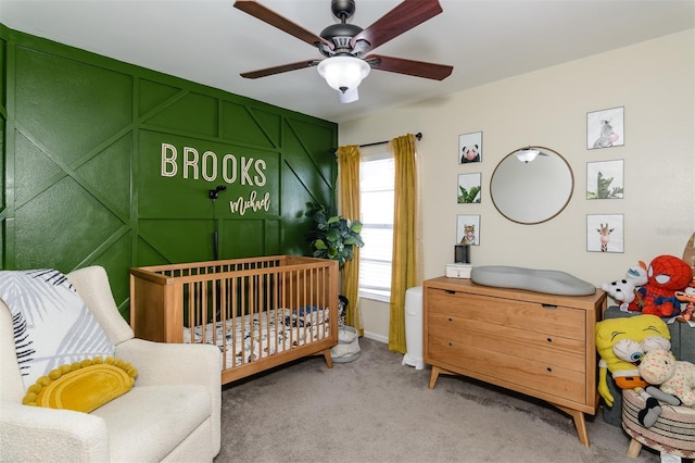 bedroom with a ceiling fan and carpet floors