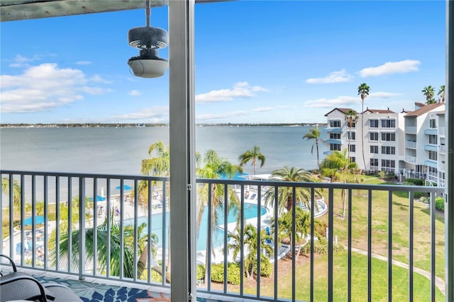 balcony featuring a water view