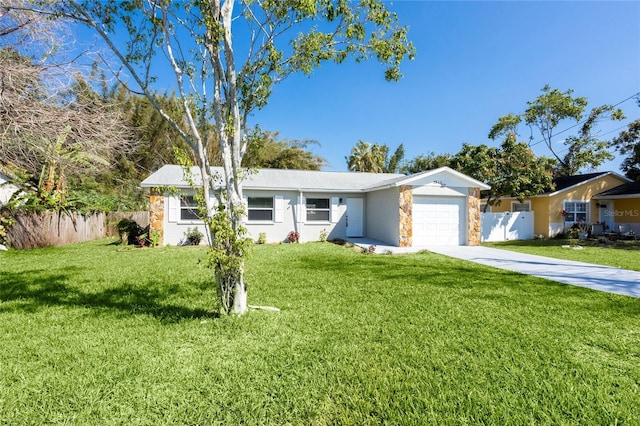 single story home with an attached garage, driveway, a front yard, and fence