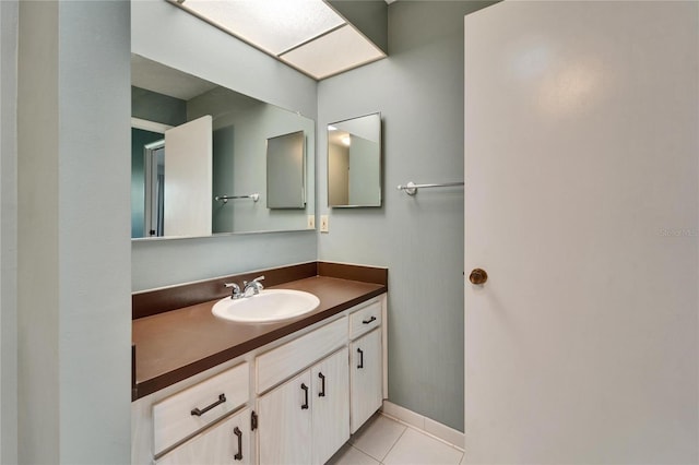 bathroom featuring tile patterned floors and vanity