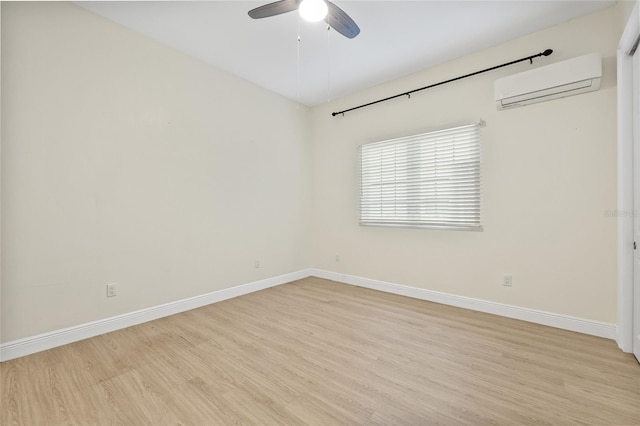 unfurnished room featuring baseboards, light wood-style floors, ceiling fan, and a wall mounted AC