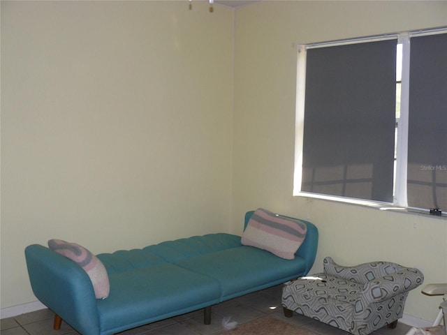 sitting room with tile patterned floors