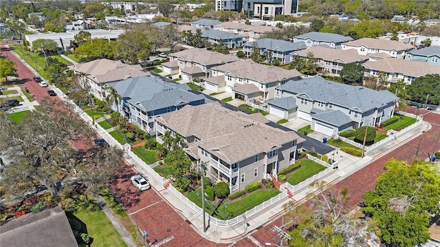 birds eye view of property with a residential view