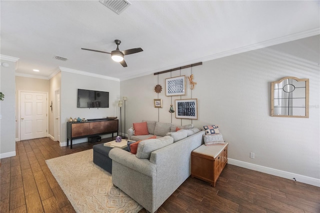 living room with ceiling fan, wood finished floors, visible vents, and ornamental molding