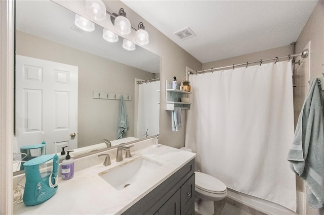 bathroom featuring vanity, curtained shower, toilet, and visible vents