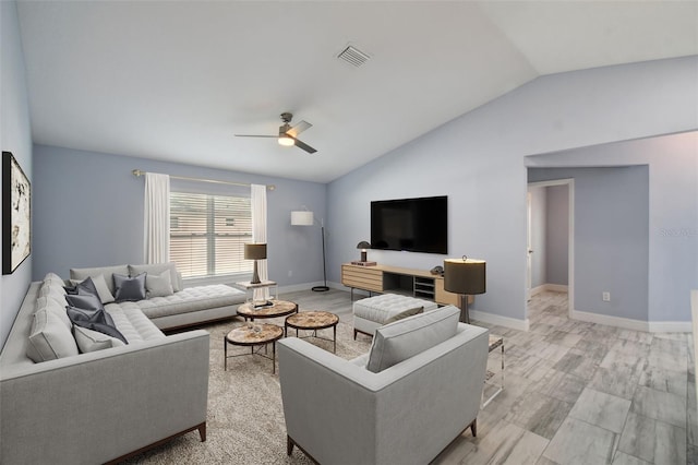 living room with baseboards, visible vents, a ceiling fan, and lofted ceiling