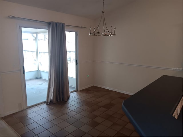 unfurnished dining area with tile patterned floors and a notable chandelier