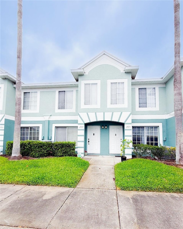 view of property featuring stucco siding