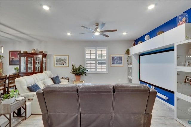 living area with recessed lighting and ceiling fan