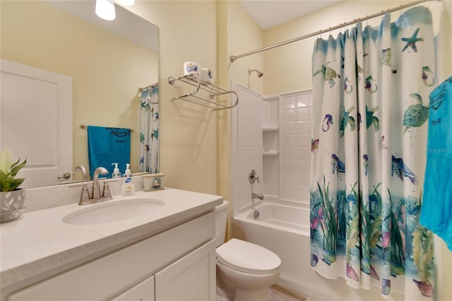 full bath featuring toilet, shower / bath combo with shower curtain, and vanity