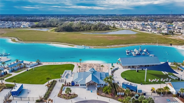 aerial view featuring a water view and a residential view