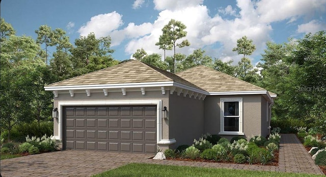 ranch-style house with stucco siding, an attached garage, and decorative driveway