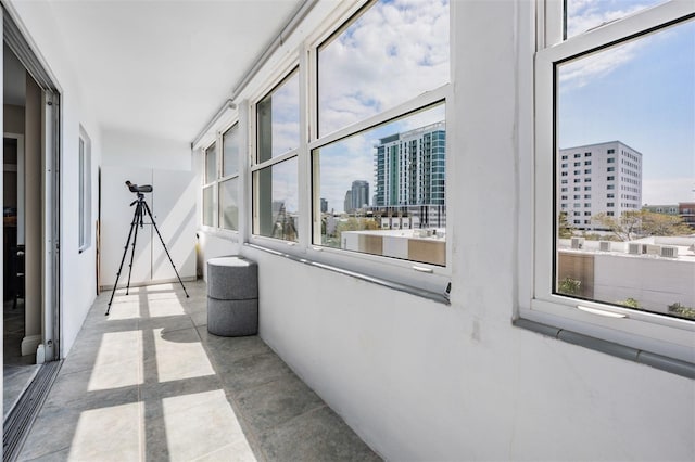 corridor with a city view