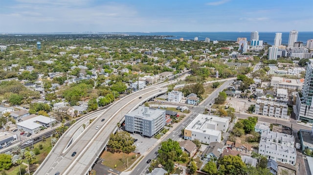 birds eye view of property with a view of city