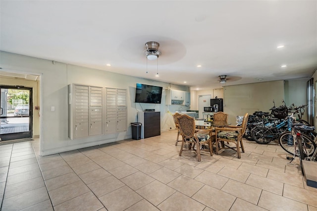 dining area featuring light tile patterned floors, mail area, ceiling fan, and recessed lighting
