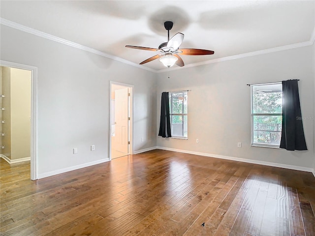 unfurnished room featuring ceiling fan, baseboards, hardwood / wood-style floors, and ornamental molding