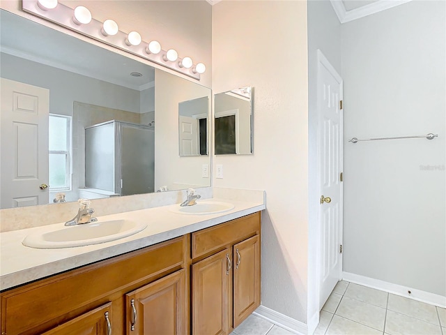 bathroom with a sink, a shower stall, tile patterned floors, and double vanity