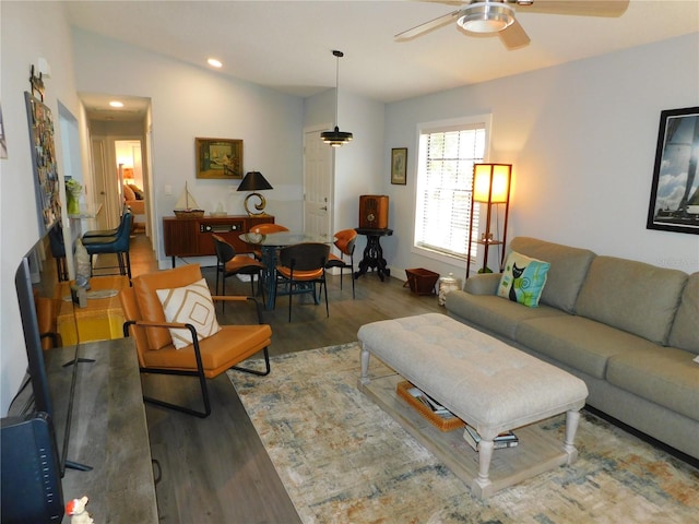 living area featuring recessed lighting, a ceiling fan, and wood finished floors